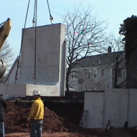 Innovative pre-cast concrete retaining wall segments for urban project  being installed (part of our 'Value Engineering' saving the customer @ $250,000)