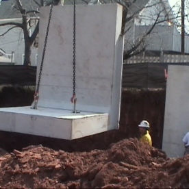 Innovative pre-cast concrete retaining wall segments for urban project  being installed (part of our 'Value Engineering' saving the customer @ $250,000)