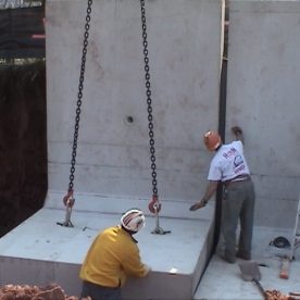 Innovative pre-cast concrete retaining wall segments for urban project  being installed (part of our 'Value Engineering' saving the customer @ $250,000)