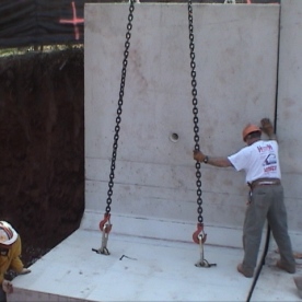 Innovative pre-cast concrete retaining wall segments for urban project  being installed (part of our 'Value Engineering' saving the customer @ $250,000)