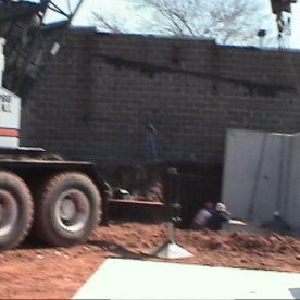 Innovative pre-cast concrete retaining wall segments for urban project  being installed (part of our 'Value Engineering' saving the customer @ $250,000)