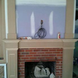 Old brick fireplace renovation in process
