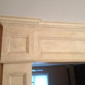 Custom trim and paneled archway detail