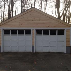 Farmhouse garage restoration and siding IN PROCESS