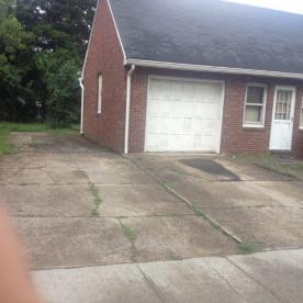 One car garage and breezeway being converted to a two car garage BEFORE