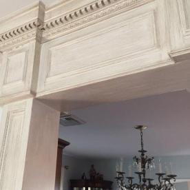 Custom paneled trim archway with crown and dental molding with faux paint effect COMPLETED