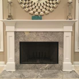 Clean-line wood mantle and marble fireplace surround/hearth