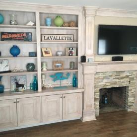 Custom bookcases and storage cabinets to compliment modernization of old brick fireplace COMPLETED