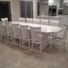 Interior gut renovation with custom made stone kitchen table and wood bases