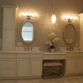 Master Bath vanities with storage towers and seated makeup area