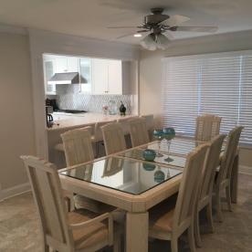 Relocated kitchen with breakfast bar/pass thru