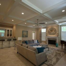 Family room addition with wood burning fireplace and wet bar